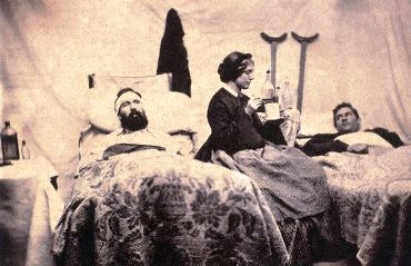 This US Civil War era photo speaks to the history and tradition of nursing.  In it, Nurse Anne Bell is shown tending to two wounded Union soldiers in Nashville, Tennessee.